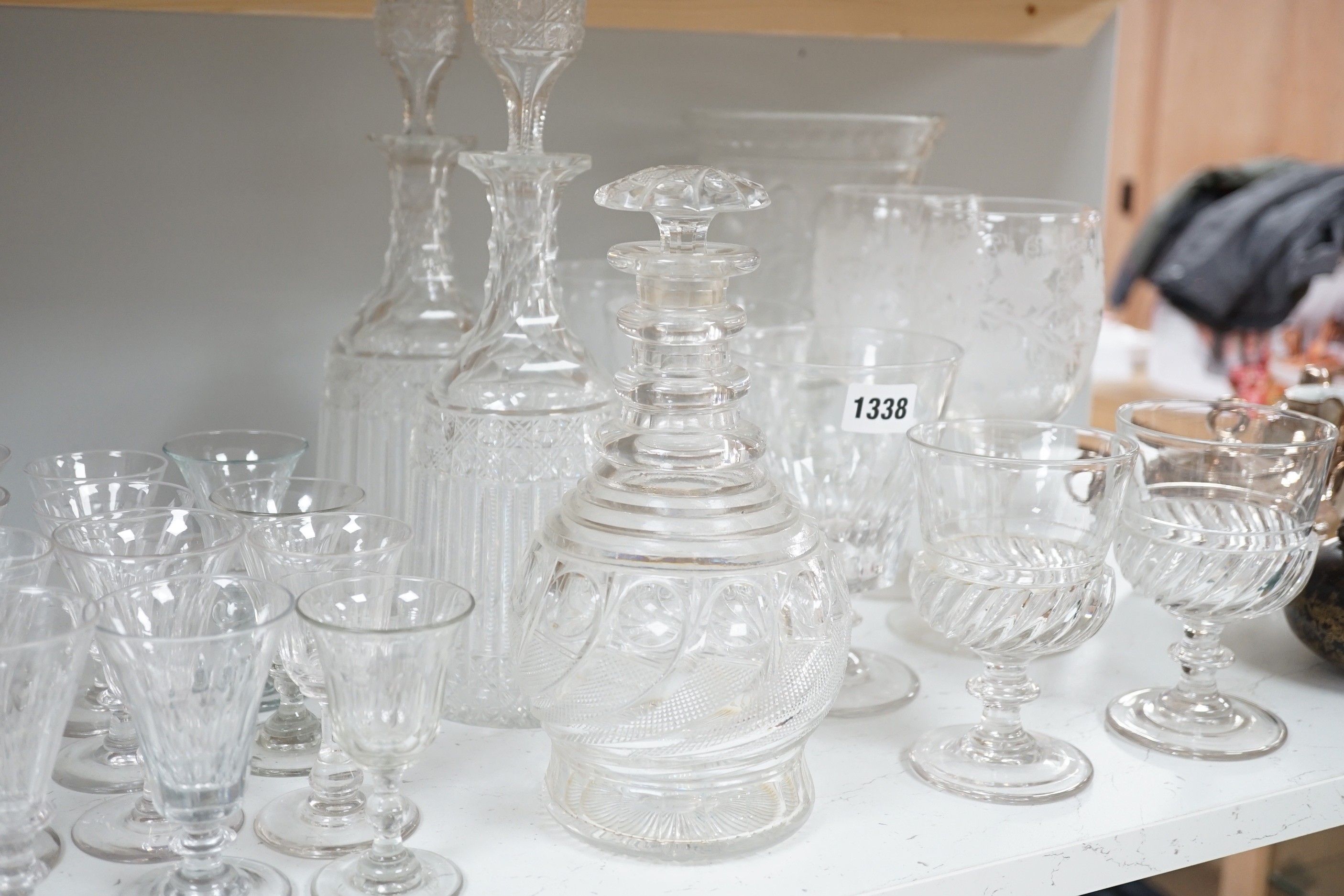 Assorted 19th and 20th century drinking glasses, rinsers, an etched vase, a pair of cut glass decanters and a late Georgian Anglo-Irish decanter and stopper